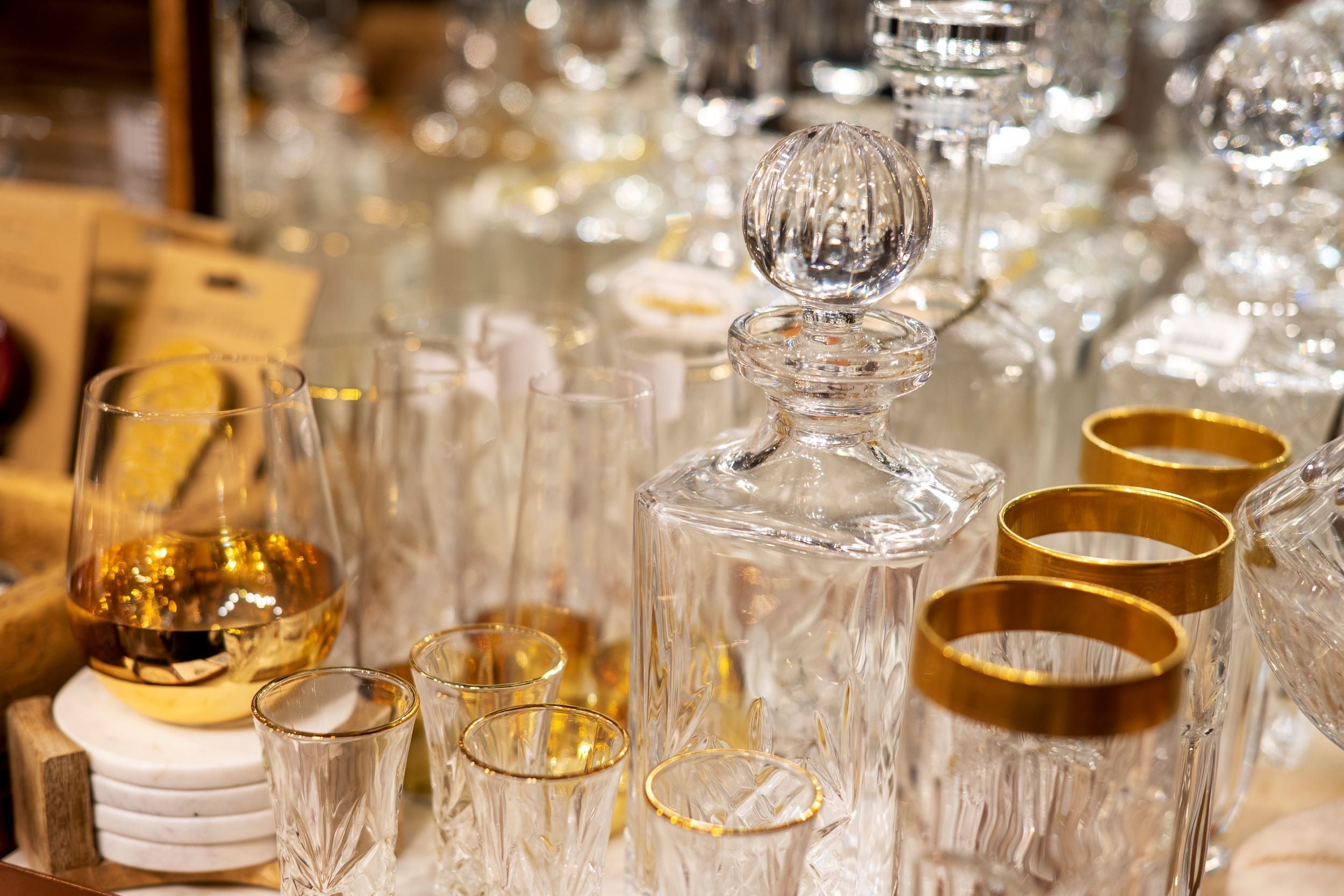 home bar. We sell interesting wineglasses, tumblers, pint glasses, decanters, shot glasses, cocktail shakers, coasters, crystal barware, gold