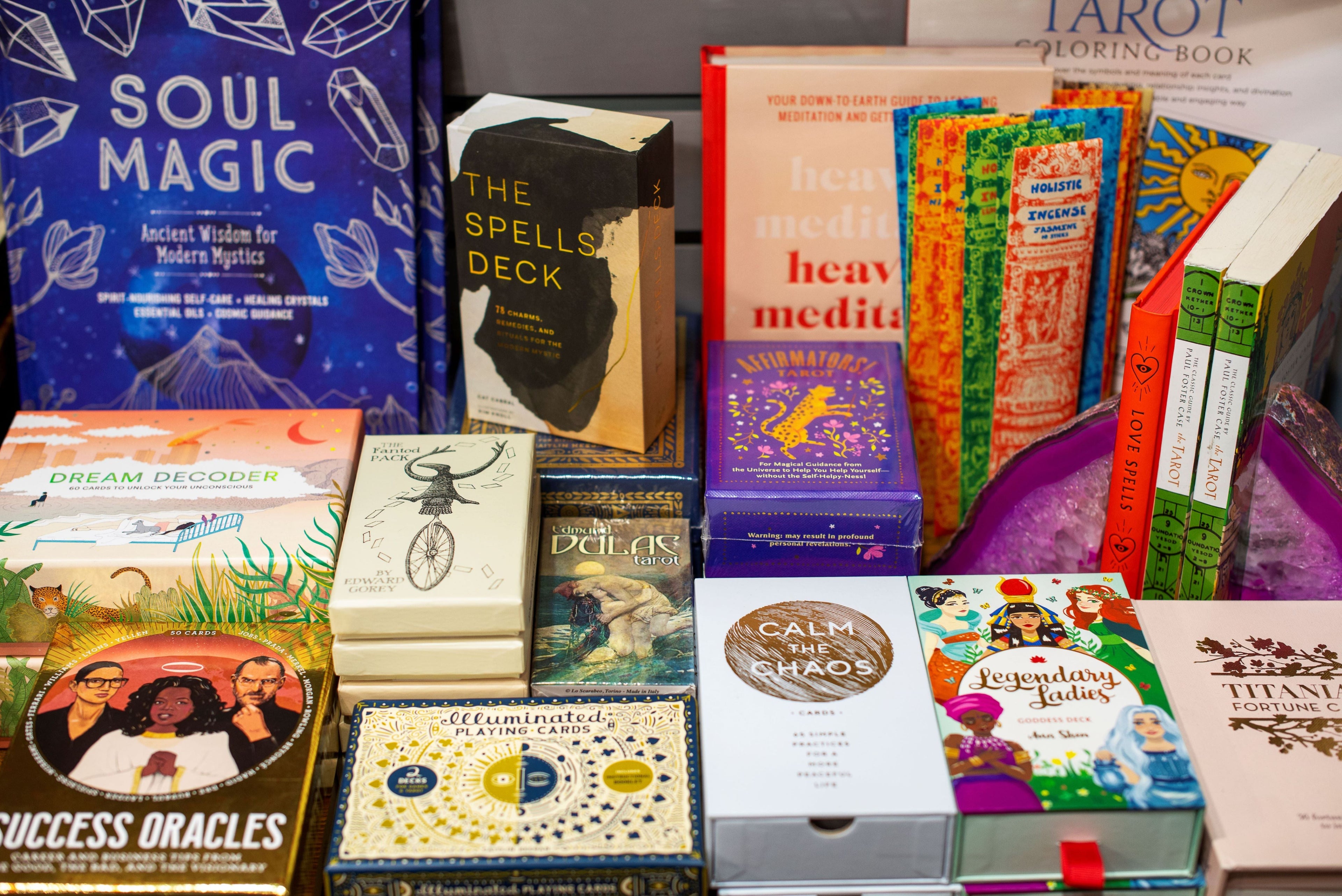 tarot cards, spell decks, palm reading, tea leaf reading, oracle cards, fortunes, and other divine decks