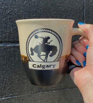 Calgary Cream Bucking Cowboy Mug