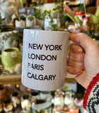 New York, London, Paris, Calgary Mug