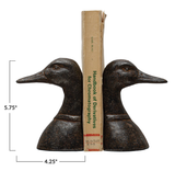 Duck Head Bookends, Add a touch of interest to your home with these Distressed Duck Head Bookends. The heavy duty bookends are made of cast iron and will keep your libary shelves looking organized and classy. 