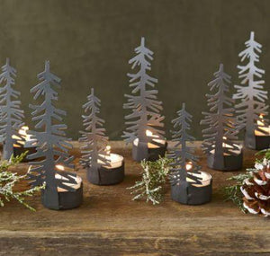 This Medium Nordic Tealight Holder is a lovely way to decorate your home. The black tree gives off a beautiful ambiance to create a cozy and warm environment. The candle holder is a lovely gift, stocking stuffer or home decor piece.