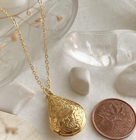 gold tear drop locket, jewelry, necklace, calgary