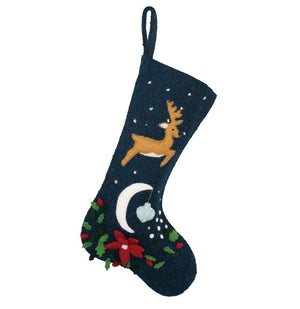 handmade wool felt christmas stocking featuring a reindeer flying over a moon