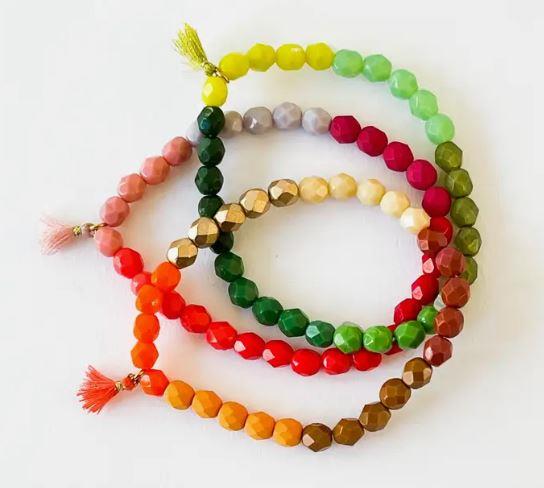 green bead bracelet.