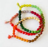 red colorblock bead bracelet. 