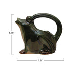 Water your indoor garden in style with the Stoneware Green Frog Watering Pitcher. The watering can is made of stoneware and measures 7-1/2"L x 5-3/4"W x 6-3/4"H it holds 32 ounces of water, just enough to give your plants a good drink of water. The frog i