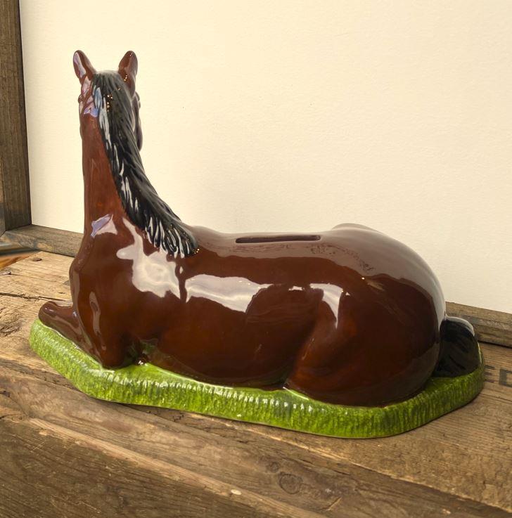 Thoroughbred Horse Bank/Decor, The Thoroughbred Coin Bank, can be used to save your loose change in or as a decorative piece in any room of your home. The very fine detailing shows our the skill of our ceramics artist. Slot for coins and a rubber stopper 