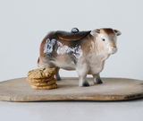 Vintage Style Cow Cookie Jar is made from a vintage reproduction. Use this Cow Cookie Jar for tea bags, cookies or snacks. A fun addition to any rustic style or farm style kitchen.