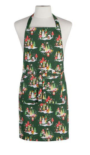 this green cotton apron from danica features scenes of a gnome christmas