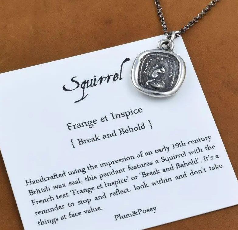 squirrel necklace, sterling silver, handmade in canada means stop and reflect
