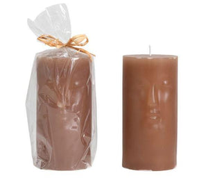 face candle. unscented candle