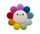 This adorable rainbow daisy teether is a great gift for a new born baby. The teether will bring relief to the baby while teething. The Daisy has rainbow colored petals and an cute as a button smile.
