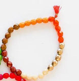 orange colorblock bead bracelet. 