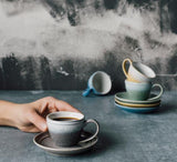 The Mineral Blue Espresso Cup and Saucer are sure to make your morning routine a cheery one. Made of stoneware, this espresso cup holds 3 ounces of your favorite variety. The set is dishwasher safe and microwave safe. 