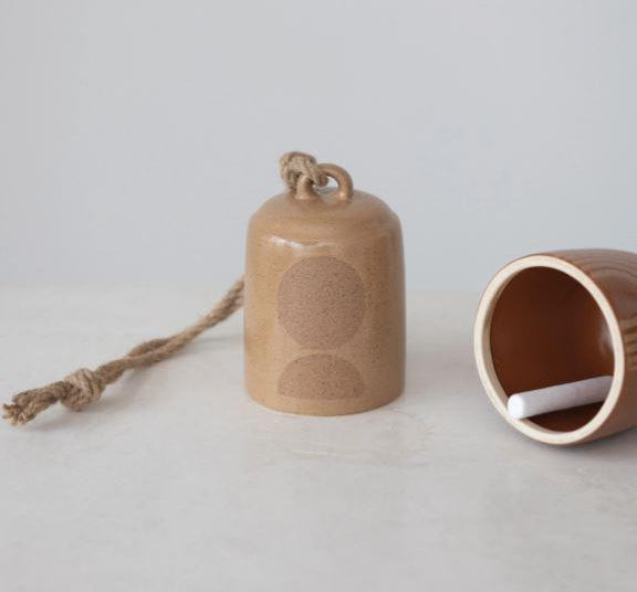 Earth Tone Stoneware Hanging Bell, Add this Earth Tone Hanging Bell to your home, place along side hanging plants to complete any room in your home. The Bell is made of stoneware and measures 3-1/2" Round x 6"H Stoneware Bell