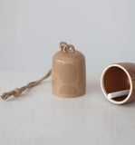 Earth Tone Stoneware Hanging Bell, Add this Earth Tone Hanging Bell to your home, place along side hanging plants to complete any room in your home. The Bell is made of stoneware and measures 3-1/2" Round x 6"H Stoneware Bell